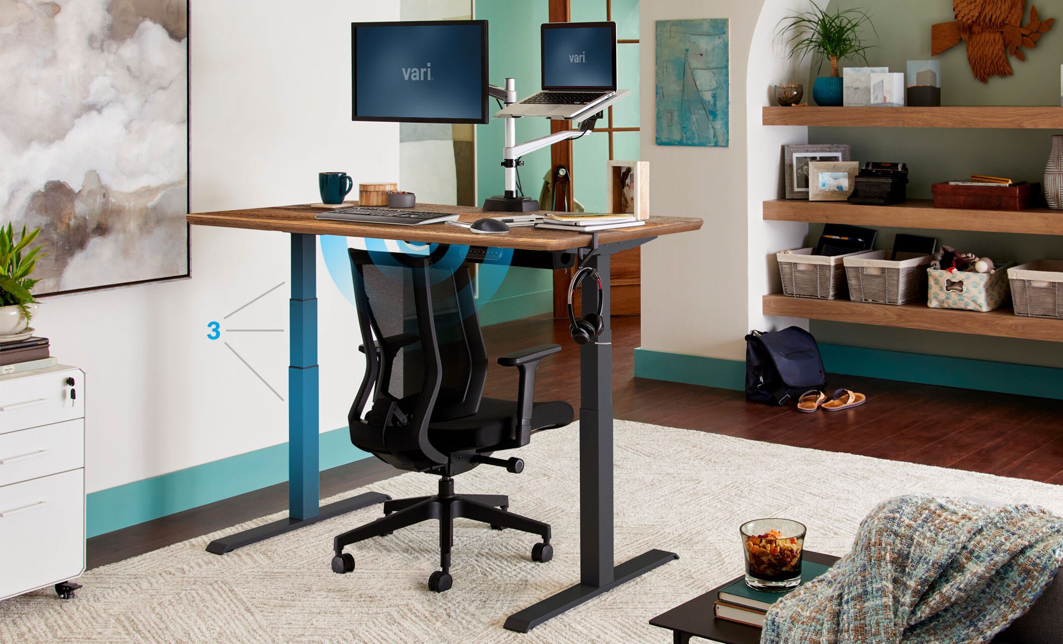 Individual standing at full electric desk working in an office setting overlooking cityscape