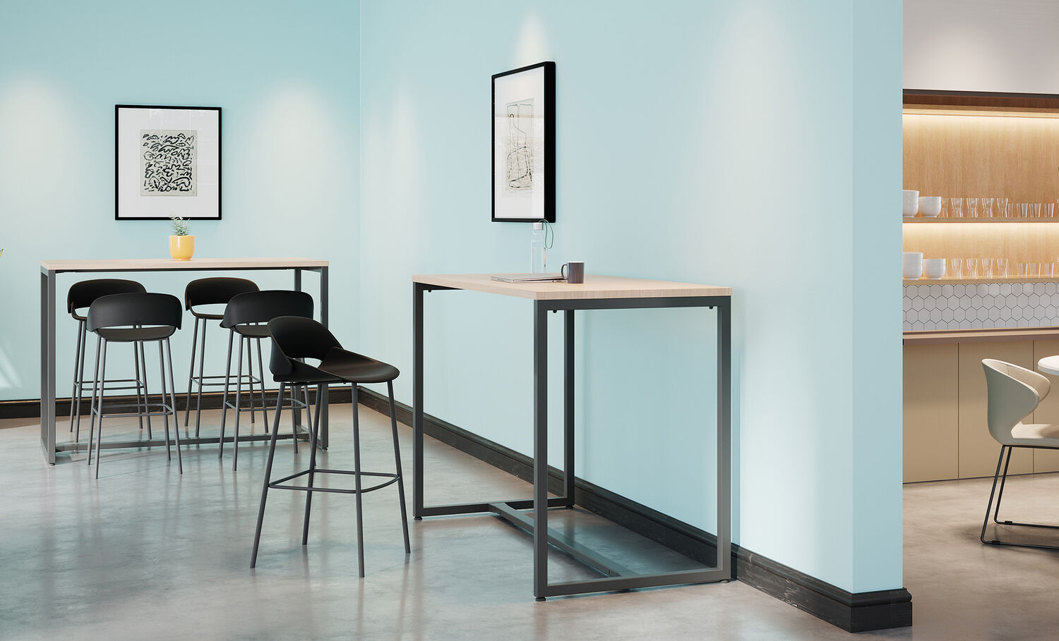 standing work table in a light wood finish setup in an open office and collaboration setting