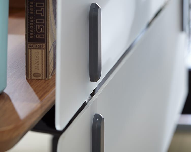 two panels are installed on one desk - one above and one below to add privacy above and modesty for women in skirts below