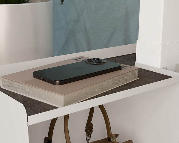 close up view of cubbies with phone and bag on storage and hook