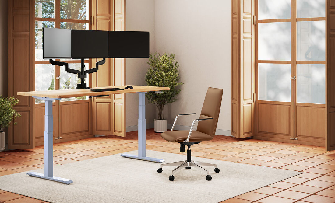 Electric standing desk Solid Wood in an at home setting