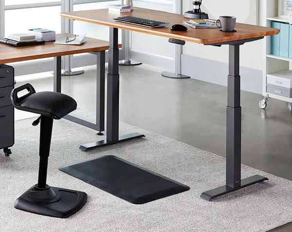 mat seen fitting perfectly between legs of Electric Standing Desk 48x30