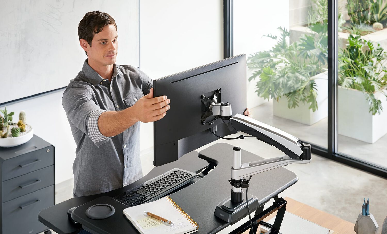 individual adjusting monitor on vari single monitor arm