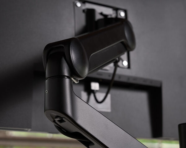 close up view of the elbow of the monitor arm 