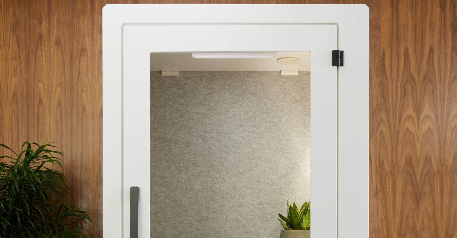 vari privacy booth with door closed in office setting