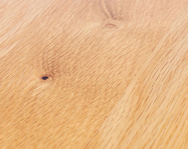 closeup detail shot of grains of solid wood desk