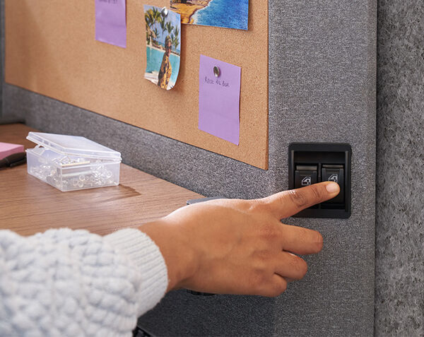 Close up of side panel individual pushing button to raise