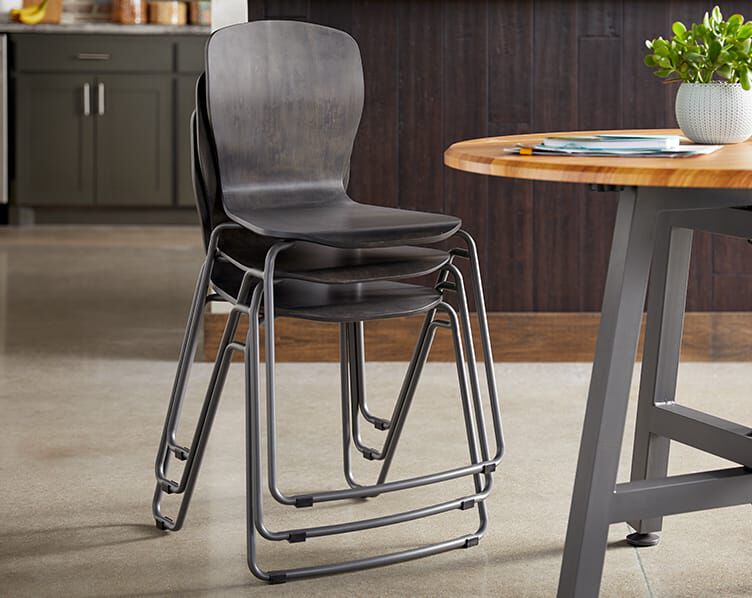 chairs seen stacked in office three high
