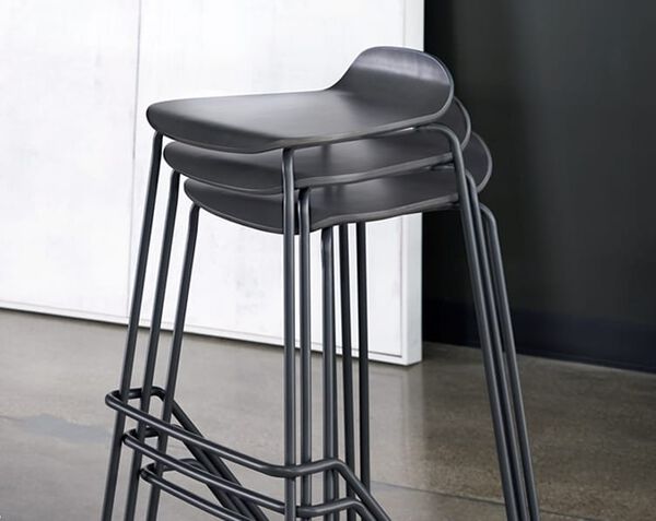 chairs seen stacked in office three high