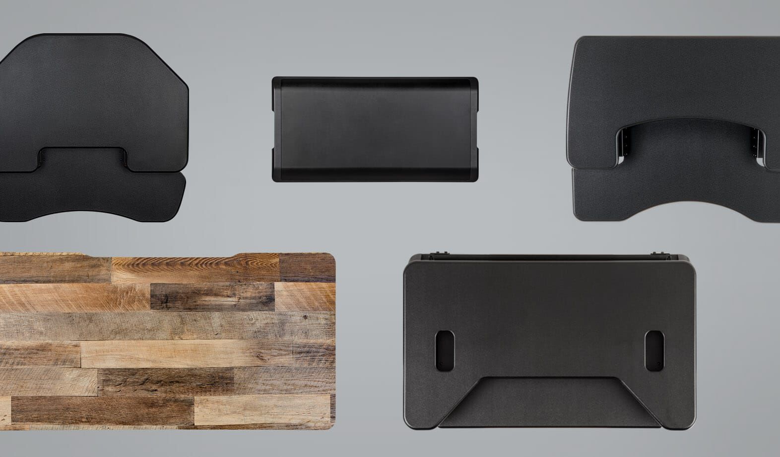 overhead view of various standing desks on a grey background