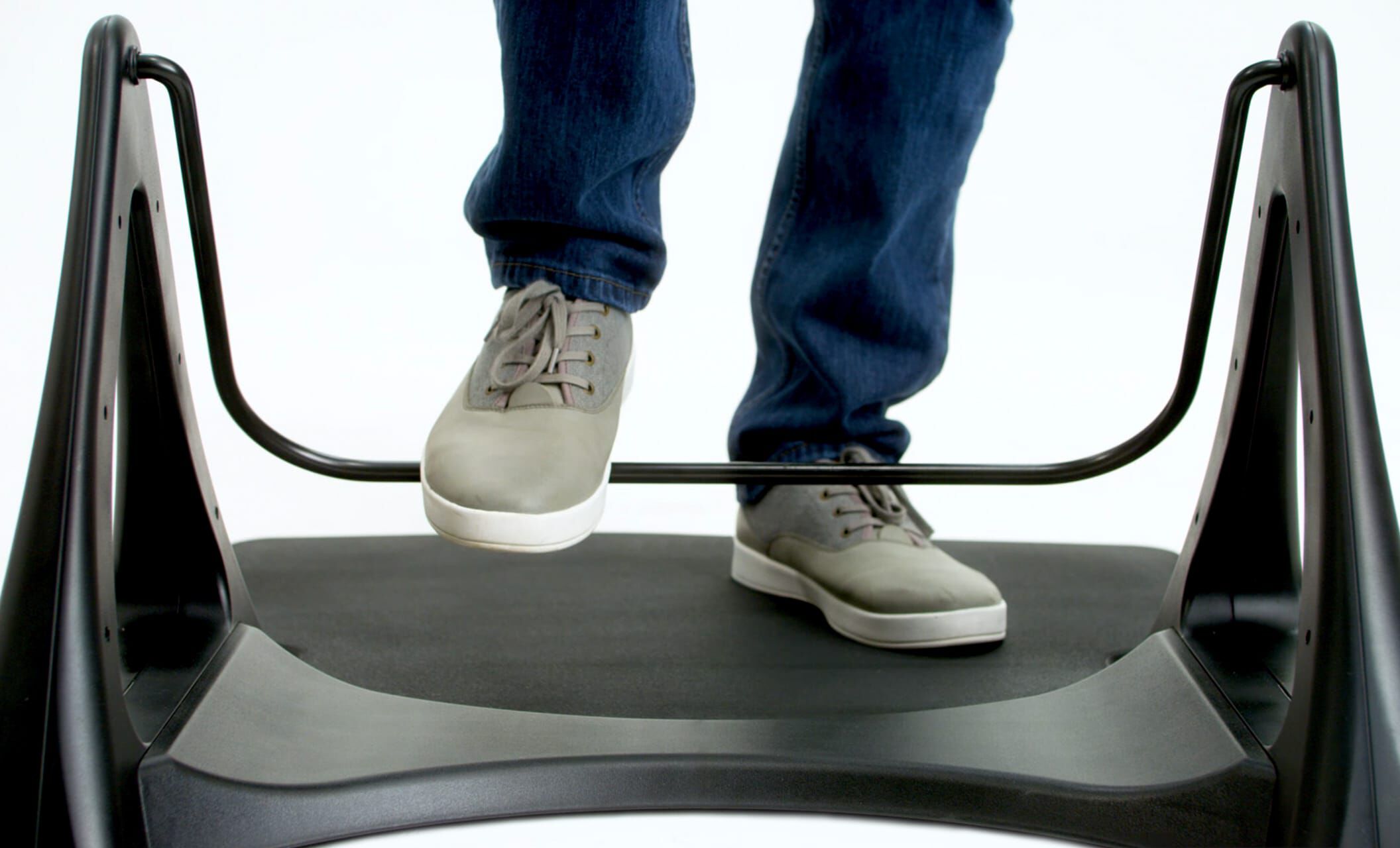 individual using vari active mat rocker