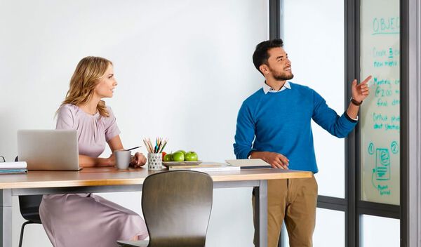 two professionals having a meeting in conference room