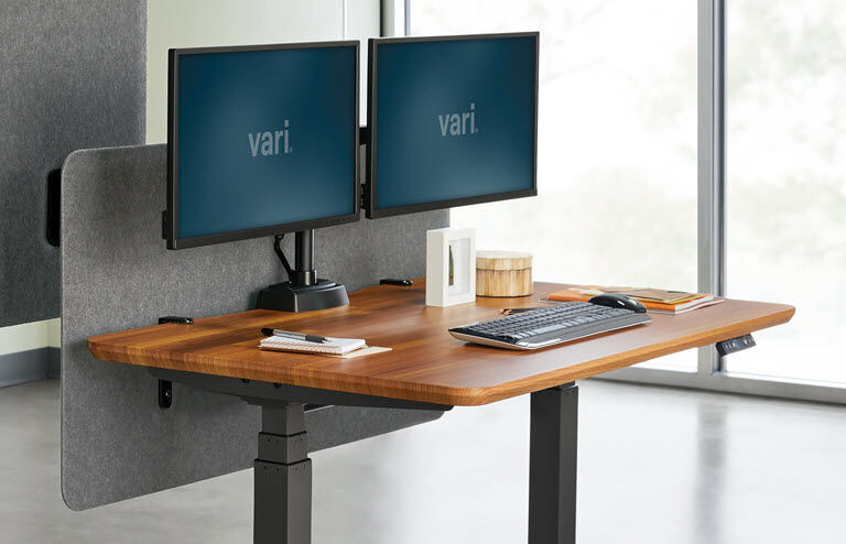 Vari Felt Panel 48 mounted on desk with office accessories