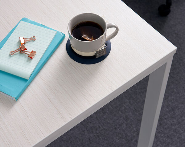 corner of essential desk 48x24 two leg in ashwood