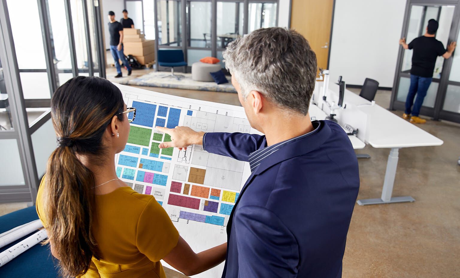 Vari space planner consults customer during office installation