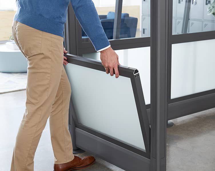 professional installing lower panel of quickflex walls