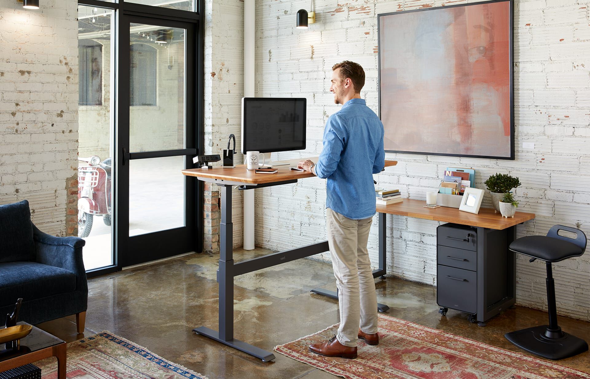 individual working in office with vari products