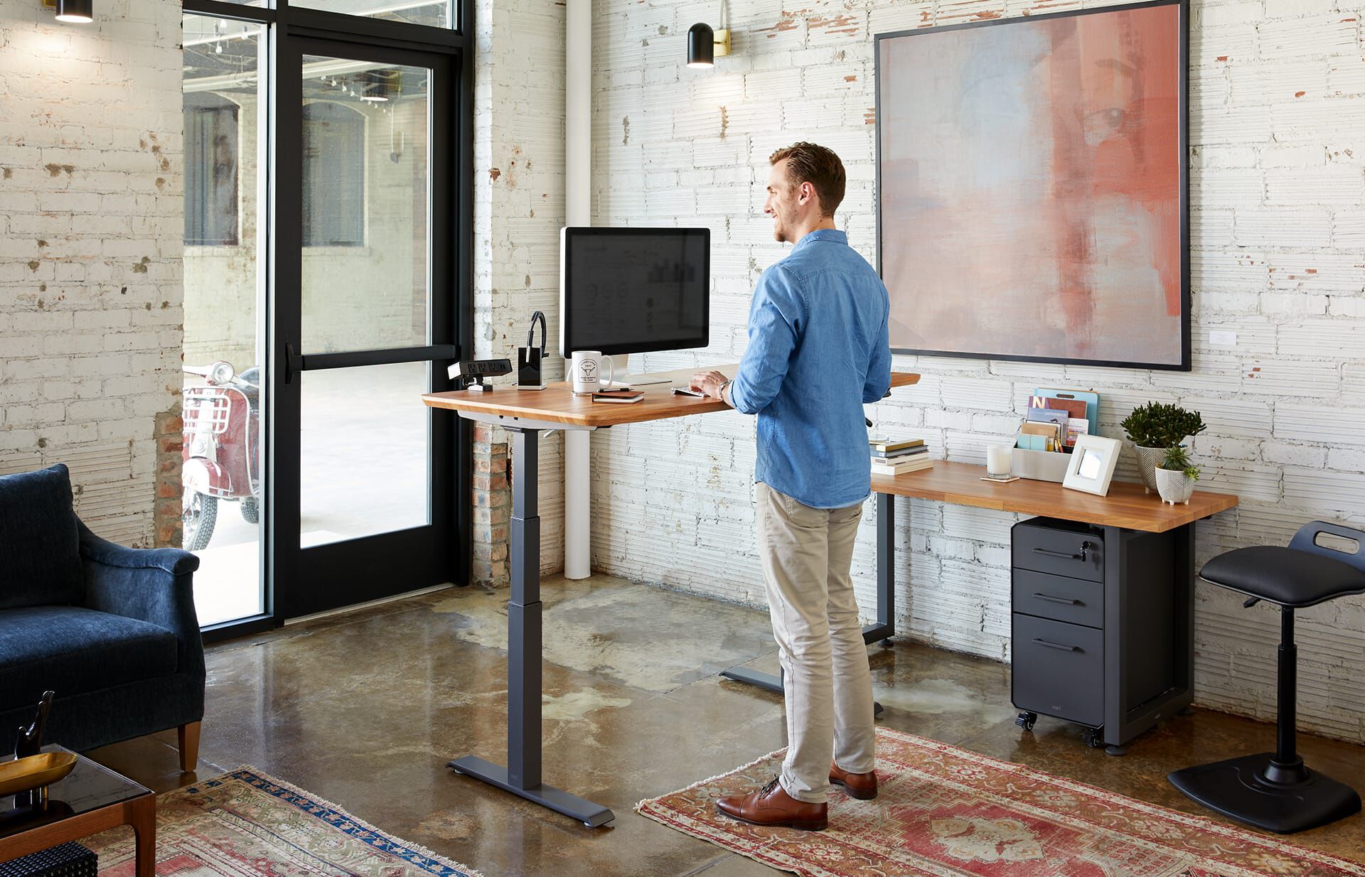 individual working in office with vari products