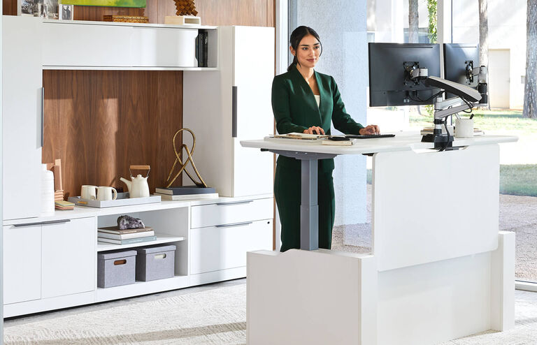 individual working in office with vari products
