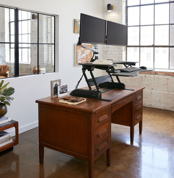 desk converter on a desk in a private office