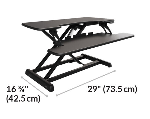 Dimension image shows that the base of the desk riser is 16 and three quarter inches deep