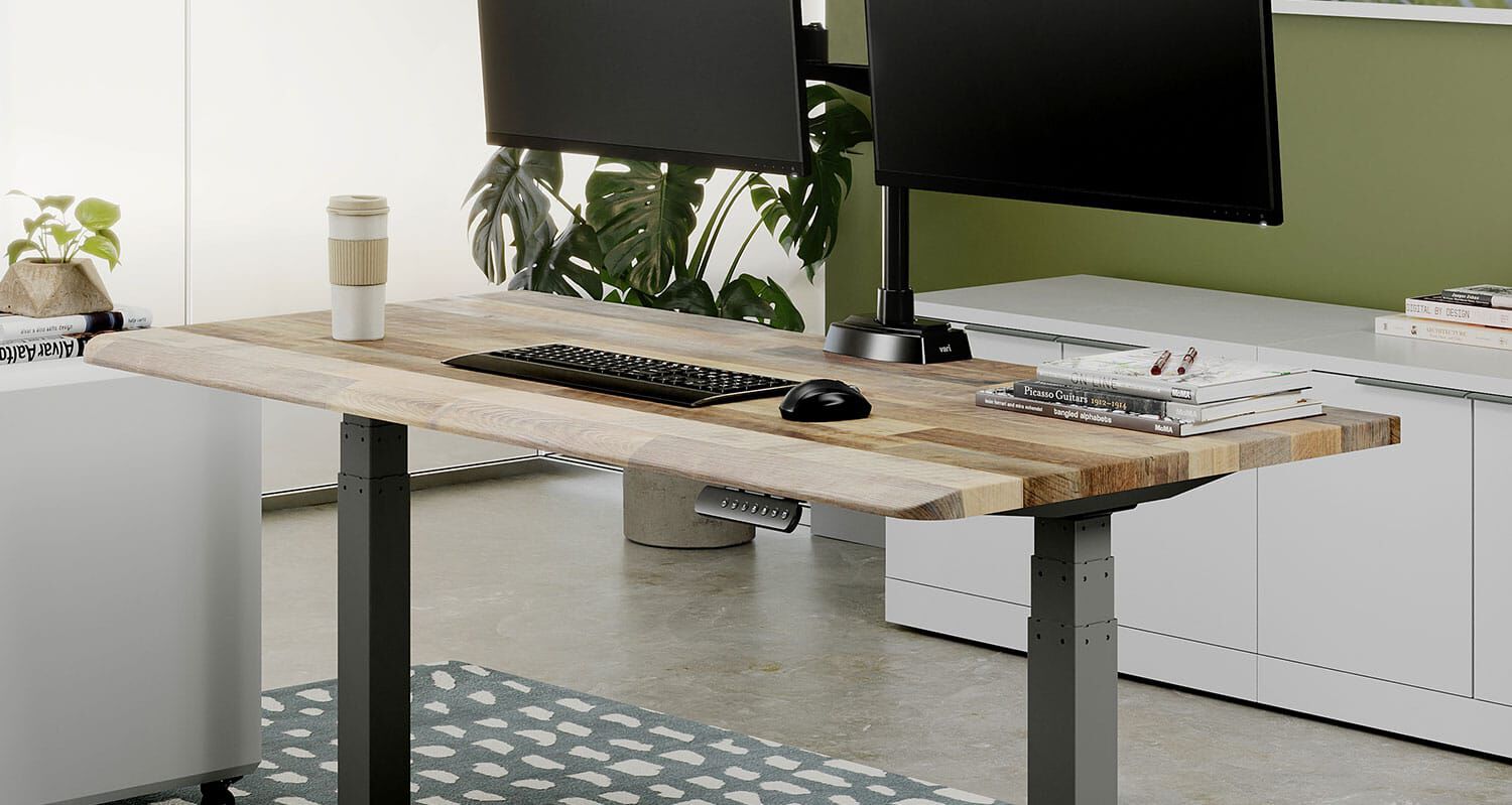vari electric standing desk with comfortedge in reclaimed wood with dual monitor arms
