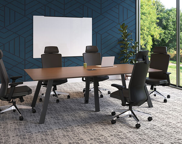 close up of chairs setup around the executive conference table in a conference room