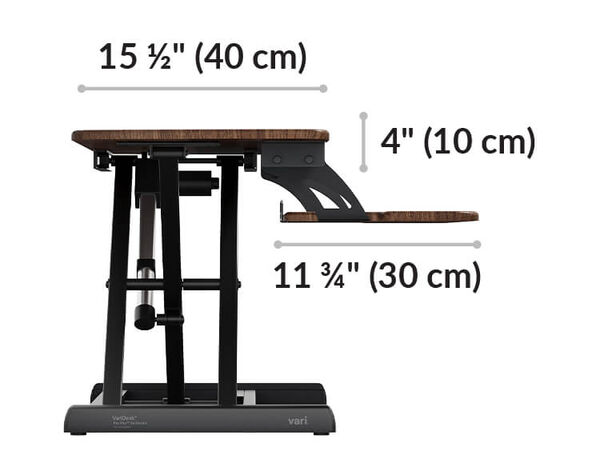 Dimension image shows that the desk riser has a keyboard tray eleven and three quarters inches deep