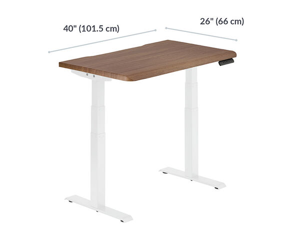electric standing desk with a walnut top is forty inches long and twenty six inches deep