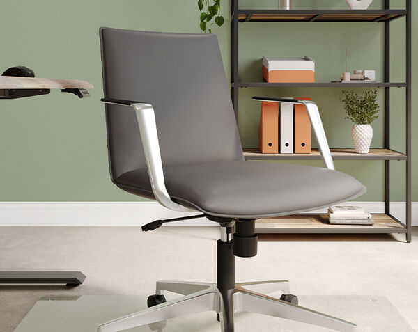 high back conference chair in executive conference room setting with l-shape electric standing desk