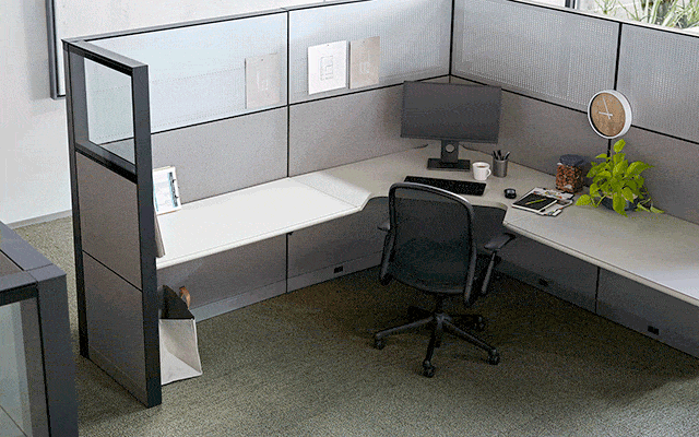 cubicle being transformed into an active workspace