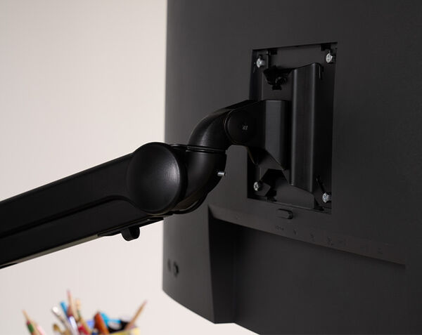 monitor attachment hardware seen from back, with the four hand tightened screws
