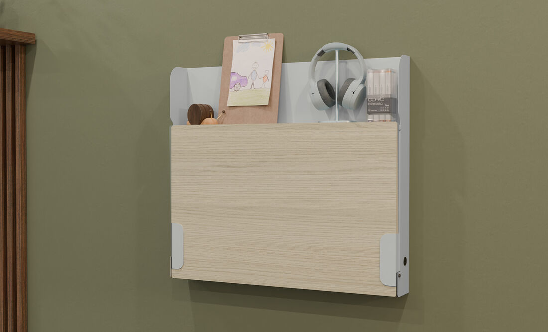 closed hide away desk with shelf holding headphones and drawing