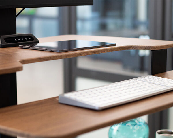 electric converter in raised position on top of a desk