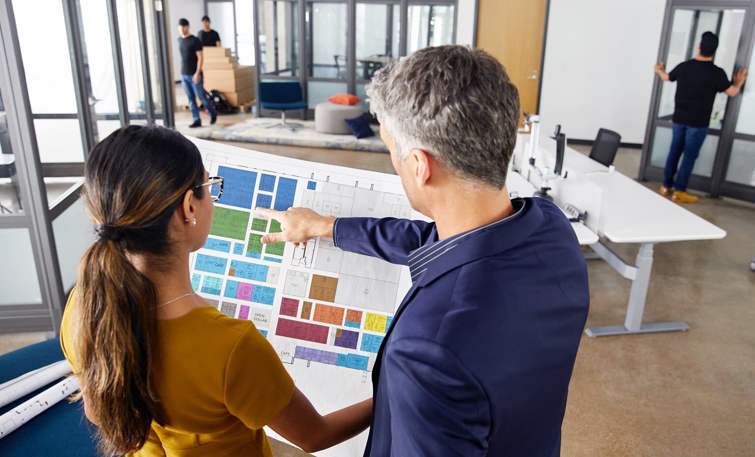 Vari space planner consults customer during office installation