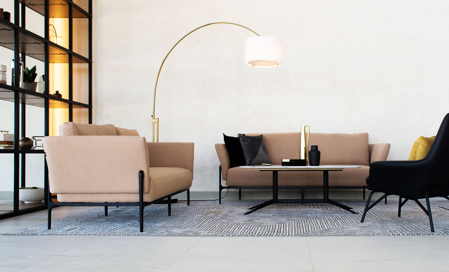 two contemporary three-seat sofas in office setting