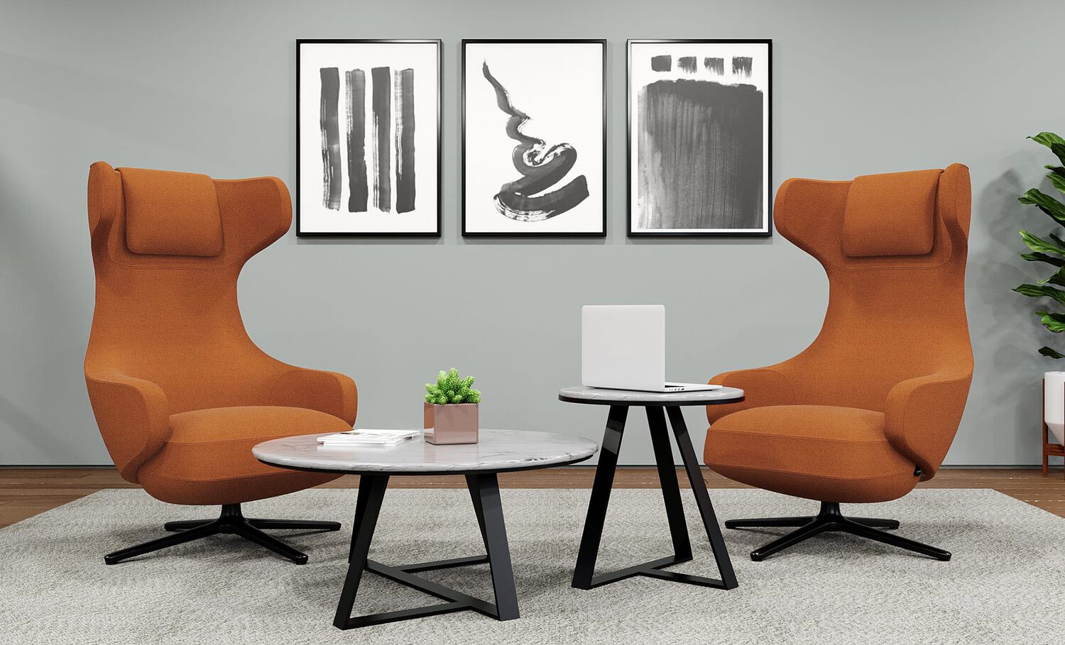 high back lounge chairs around small and large nesting table in office setting