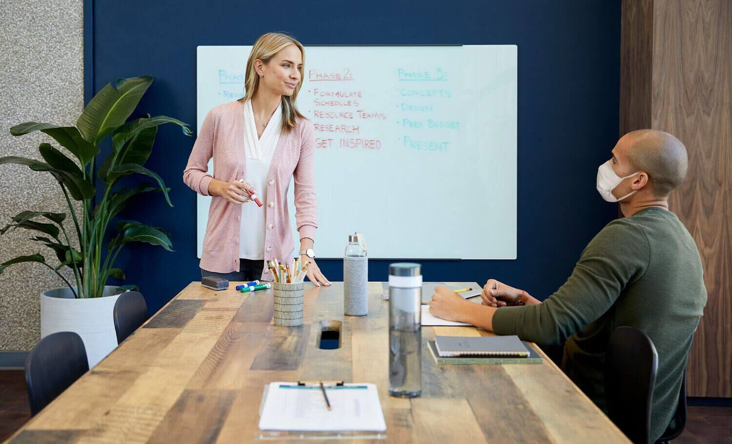 two professionals meeting in conference room