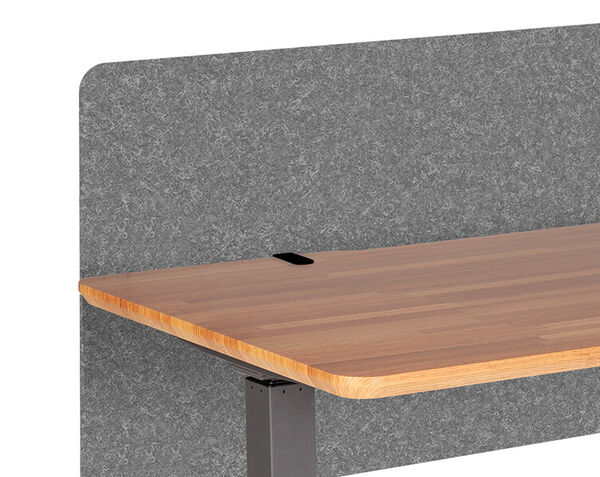 Closeup of felt panel attached to desk with mounting hardware