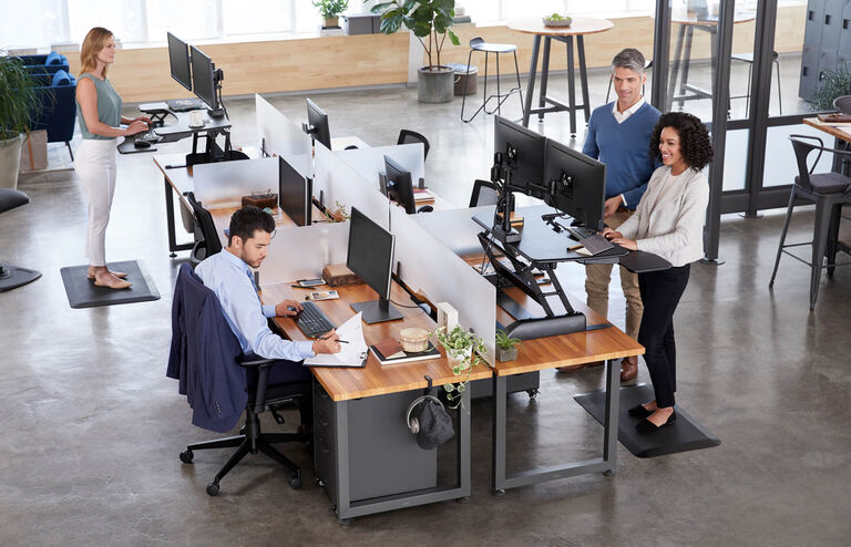 Privacy panels used to create distinct personal space while keeping the open office open.