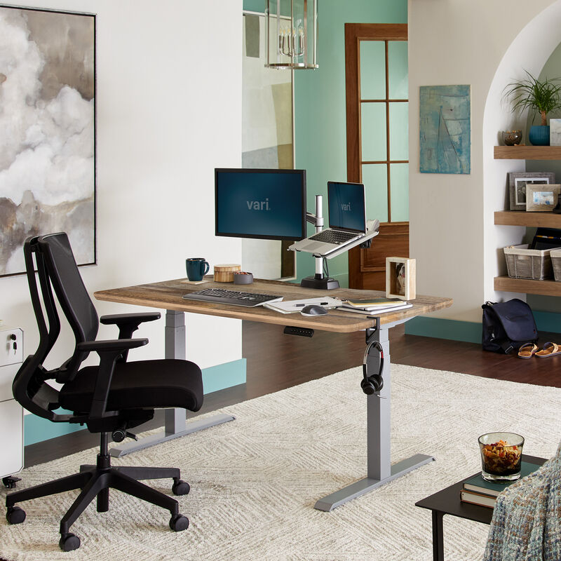 Electric Standing Desk 60x30 Butcher Block in lowered position at home image number null
