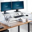 VariDesk Pro Plus 36 White sit-stand desk converter in raised position in office image