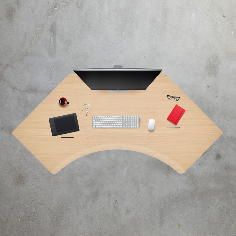 overhead view of a command center electric standing desk with a light wood desktop image number null