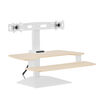 varidesk electric dual monitor converter in light wood in a raised position