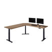 overview image of walnut l shape with monitor on desk