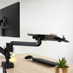 view of the back of the laptop holder installed on a desk with no laptop sitting on it 