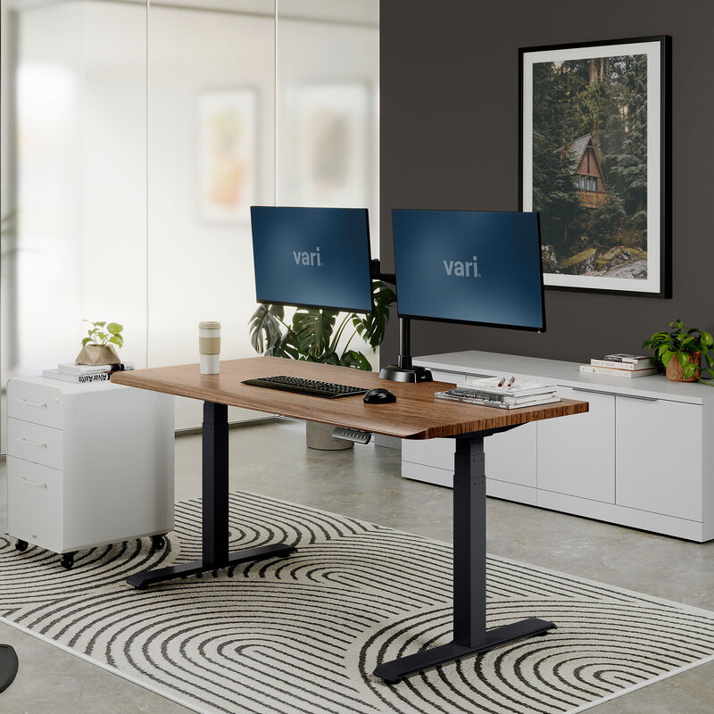 Electric Standing Desk 60x30 Walnut in raised position at home image number null