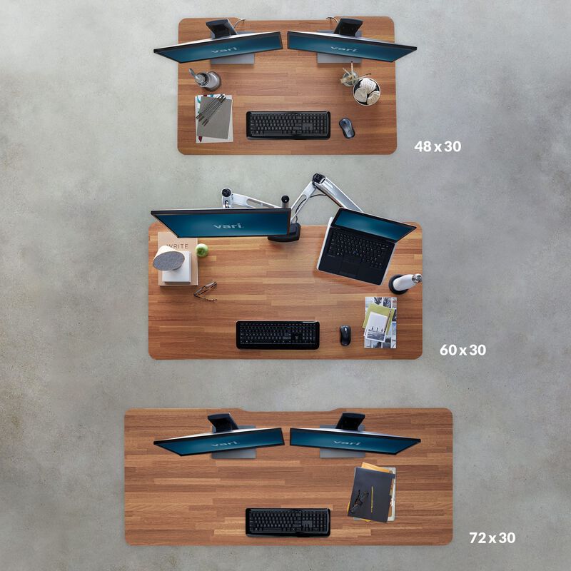 Overhead of view of the three electric standing desk sizes, forty-eight by thirty, sixty by thirty, and seventy-two by thirty. image number null