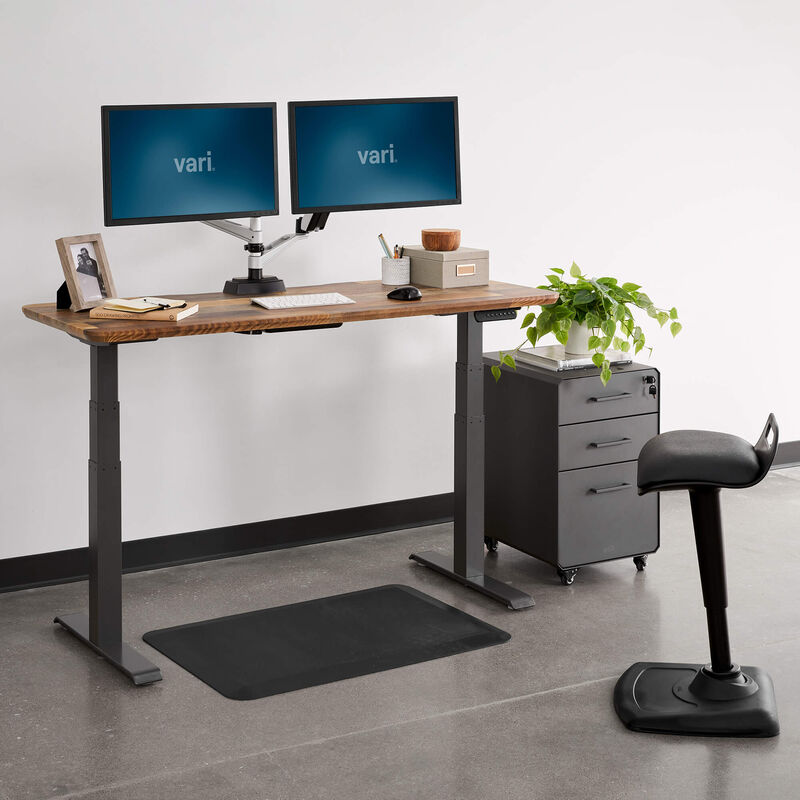 Electric Standing Desk 60 by 24 in raised position in office setting image number null