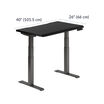 Black standing desk with labeled dimensions: 40&rdquo; (101.5 cm) wide, 26&rdquo; (66 cm) deep